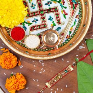 RK21TH1R25 -AccessHer Elegant Rakhi Set with Acrylic Golden Pooja Thali, Roli Kumkum for Brother