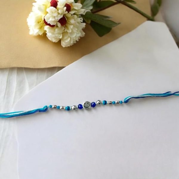 ACCESSHER Delicate Blue Beads Rakhi with Smiley Face for Beloved Brother, Kids Pack of 1/ Gifting with Roli Kumkum Packets & Happy Rakshabandhan Card - Image 2