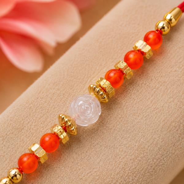 ACCESSHER Traditional Orange Beaded Rakhi with Roli, Kumkum & Raksha Bandhan Greeting Card