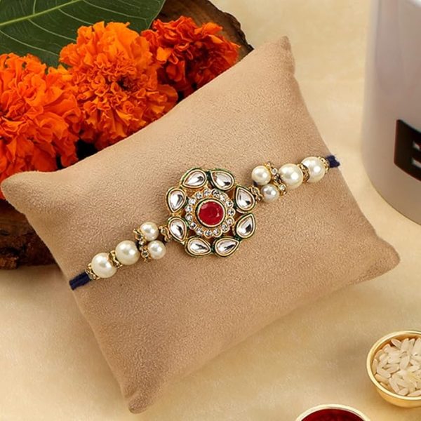ACCESSHER Embrace Tradition Kundan Rakhi - Red Ruby Floral Design for Brother, Comes with Roli/Kumkum Packets, Rice and Raksha Bandhan Card | Latest Rakhi for Brother - Image 3