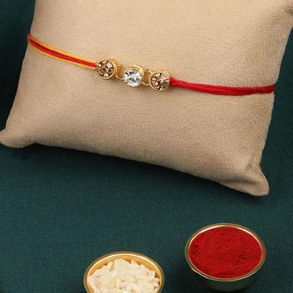 ACCESSHER Gold Plated Brass Statement Rhinestone Rakhi for Brother Pack of 1 with Roli/Kumkum Packets, Rice and Happy Rakshabandhan Card || Latest Rakhi for Brother - Image 3