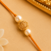 ACCESSHER Gold Plated Filigree Ball & Pearl Bhaiya Bhabhi Rakhi Set with Roli, Kumkum & Greeting Card