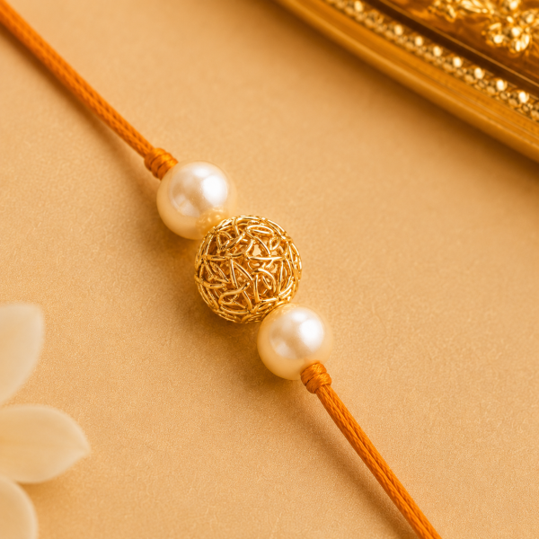 ACCESSHER Gold Plated Filigree Ball & Pearl Bhaiya Bhabhi Rakhi Set with Roli, Kumkum & Greeting Card