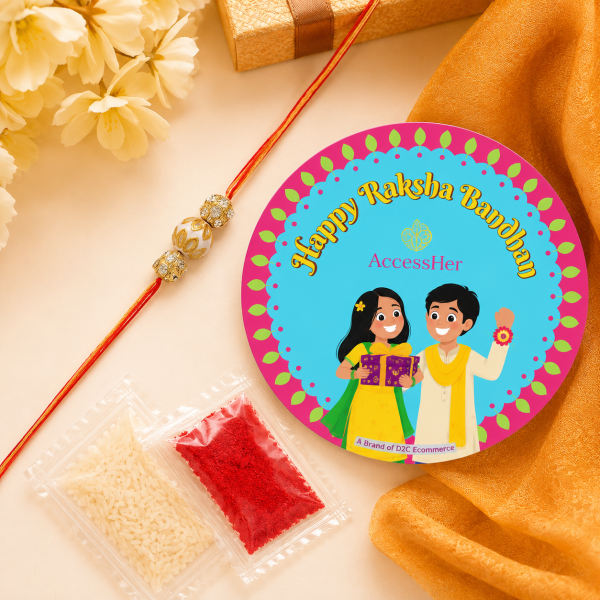 ACCESSHER Gold Plated Meenakari Pearl Rakhi - Gift Set with Roli, Kumkum & Greeting Card
