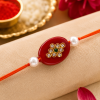 ACCESSHER Gold Plated Maroon Beads & Pearl Rakhi - Set with Roli, Kumkum & Raksha Bandhan Greeting Card