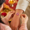ACCESSHER Pink Enamel Kundan Rakhi with Rhinestone Detailing - Gift Set with Roli, Kumkum & Raksha Bandhan Greeting Card