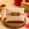 ACCESSHER Red Ganesha Lace Rakhi for Brother with Roli, Kumkum & Raksha Bandhan Greeting Card
