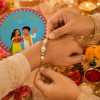 ACCESSHER Delicate Gold Beaded Rakhi - Gift Set with Roli, Kumkum & Greeting Card