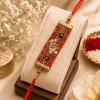 ACCESSHER Religious Shree Fabric Rakhi - Gift Set with Multicolor Detailing, Roli, Kumkum & Greeting Card