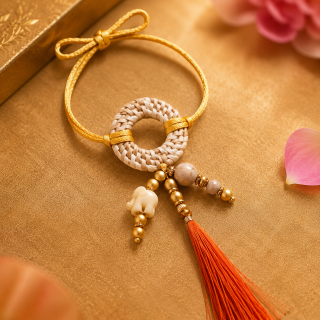 ACCESSHER Handcrafted Elephant Charm Rakhi with Tassel for Bhabhi - Gift set Roli, Kumkum & Greeting Card
