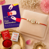 ACCESSHER Handmade White Floral Kundan Rakhi with Beads - Gift Set with Roli, Kumkum & Greeting Card