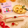Accessher Ruby Beaded Rakhi - Gift Set with Acrylic Peacock Pooja Thali, Roli, Kumkum & Greeting Card Accessher Ruby Beaded Rakhi - Gift Set with Acrylic Peacock Pooja Thali, Roli, Kumkum & Greeting Card