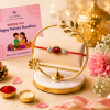 ChatGPT Image Jun 3, 2026, 02_12_34 PM (1) Accessher Ruby Beaded Rakhi - Gift Set with Acrylic Peacock Pooja Thali, Roli, Kumkum & Greeting Card