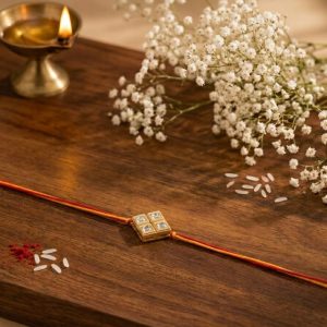 ACCESSHER Gold Plated Rhinestone Rakhi for Brother with Roli, Kumkum & Raksha Bandhan Greeting Card