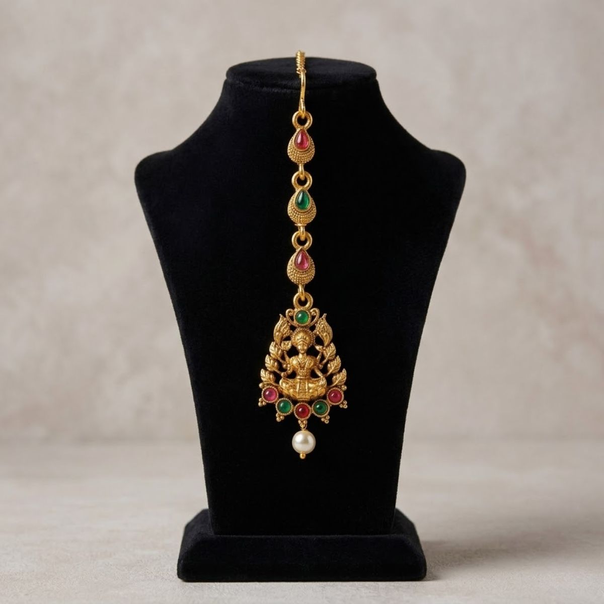Accessher Matte Gold Plated Lakshmi Mata Maang Tikka with Ruby & Emerald Detailing - Temple Jewellery Inspired Design - Image 4